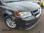 2015 Dodge Grand Caravan SXT with VIN 2C4RDGCG5FR541105, listed as a IAAI auction lot 43282570 with 176,921 mi miles and . Bid and sale history available at DreamBid. Image 6.