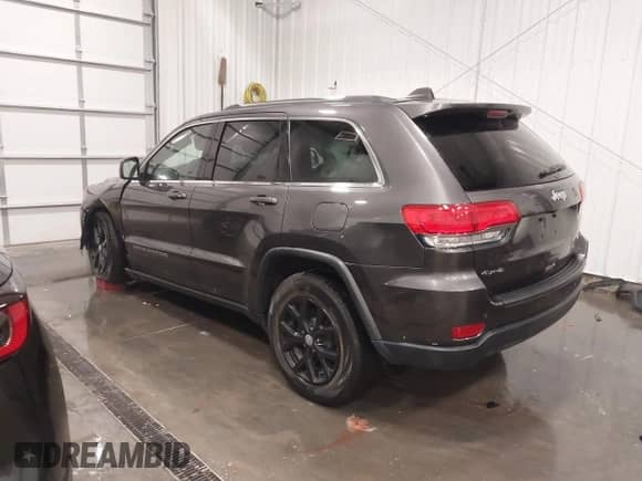2017 Jeep Grand Cherokee Laredo z VIN 1C4RJFAG2HC706836, wystawiony jako IAAI lot #42254023 z przebiegiem 42 725 mil mil oraz . Historia ofert i sprzedaży dostępna na DreamBid. Obrazek 3.