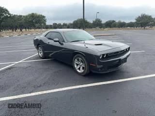 2021 Dodge Challenger SXT с VIN 2C3CDZAG2MH627290, выставлен на аукционе Copart как лот 90298955 с пробегом 72 280 миль миль и Списание • Salvage title. История ставок и продаж доступна на DreamBid. Изображение 1.