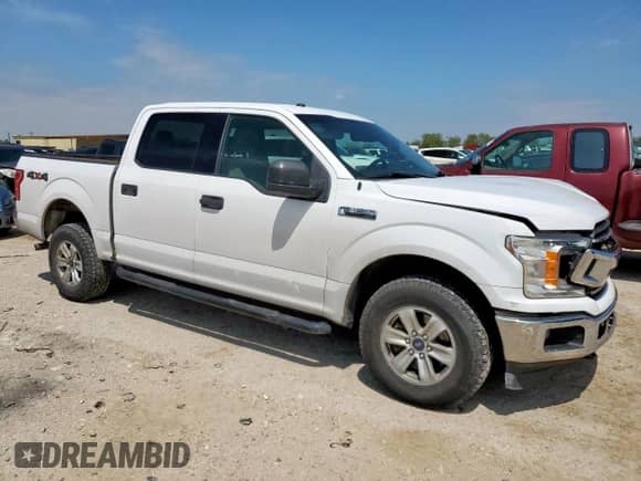 2018 Ford F-150 XL с VIN 1FTEW1E50JKE01925, выставлен на аукционе Copart как лот 72013945 с пробегом 162 110 миль миль и Списание • Salvage title. История ставок и продаж доступна на DreamBid. Изображение 4.