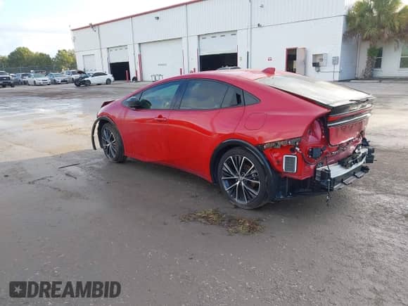 2024 Toyota Prius LE with VIN JTDACAAU7R3023449, listed as a IAAI auction lot 43136259 with 31,158 mi miles and . Bid and sale history available at DreamBid. Image 3.