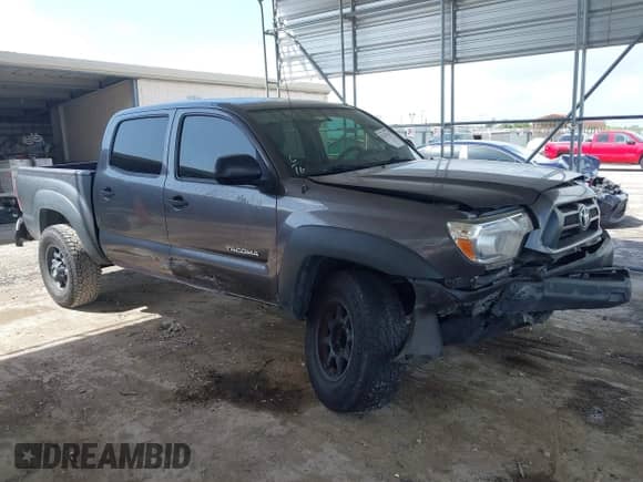 2014 Toyota Tacoma PreRunner z VIN 5TFJX4GN8EX031794, wystawiony jako IAAI lot #42533121 z przebiegiem 117 116 mil mil oraz . Historia ofert i sprzedaży dostępna na DreamBid. Obrazek 1.