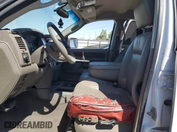 2007 Dodge 2500 Laramie z VIN 3D7KS29A67G803496, wystawiony jako Copart lot #69790205 z przebiegiem Nie podano mil oraz Szkoda całkowita • Salvage title. Historia ofert i sprzedaży dostępna na DreamBid. Obrazek 7.