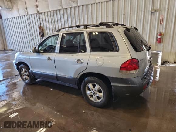 2005 Hyundai Santa Fe GLS z VIN KM8SC73E25U003249, wystawiony jako Copart lot #80127675 z przebiegiem 51 534 mil mil oraz Nie do naprawy • Non repairable. Historia ofert i sprzedaży dostępna na DreamBid. Obrazek 2.