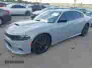 2022 Dodge Charger GT with VIN 2C3CDXHGXNH173883, listed as a IAAI auction lot 43255641 with 36,149 mi miles and . Bid and sale history available at DreamBid. Image 17.