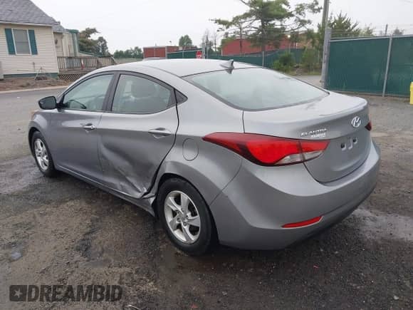2015 Hyundai Elantra SE z VIN KMHDH4AE6FU291600, wystawiony jako IAAI lot #42850304 z przebiegiem 71 842 mil mil oraz . Historia ofert i sprzedaży dostępna na DreamBid. Obrazek 3.