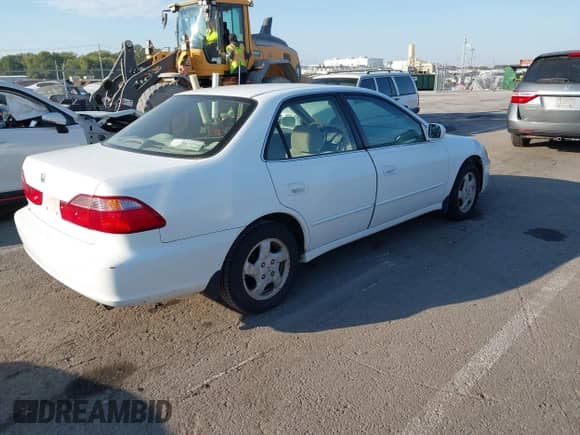 1999 Honda Accord EX with VIN JHMCG5654XC033129, listed as a IAAI auction lot 43465422 with 240,823 mi miles and . Bid and sale history available at DreamBid. Image 4.