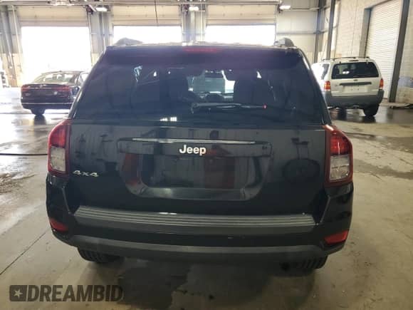 2014 Jeep Compass Sport with VIN 1C4NJDBB9ED842554, listed as a Copart auction lot 69468485 with 124,308 mi miles and Salvage title. Bid and sale history available at DreamBid. Image 6.