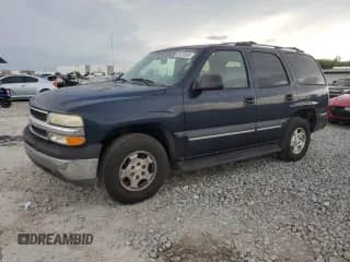 2004 Chevrolet Tahoe LT with VIN 1GNEC13Z04R122976, listed as a Copart auction lot 83970965 with 214,430 mi miles and Salvage title. Bid and sale history available at DreamBid. Image 1.