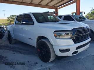 2021 Ram 1500 Laramie z VIN 1C6RREJTXMN794380, wystawiony jako IAAI lot #42054107 z przebiegiem 73 370 mil mil oraz . Historia ofert i sprzedaży dostępna na DreamBid. Obrazek 1.