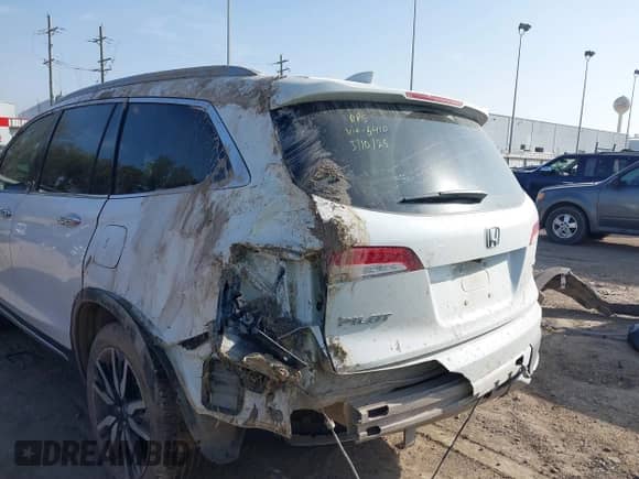 2022 Honda Pilot Touring 7-Passenger z VIN 5FNYF5H64NB015410, wystawiony jako IAAI lot #41776850 z przebiegiem 39 475 mil mil oraz . Historia ofert i sprzedaży dostępna na DreamBid. Obrazek 19.