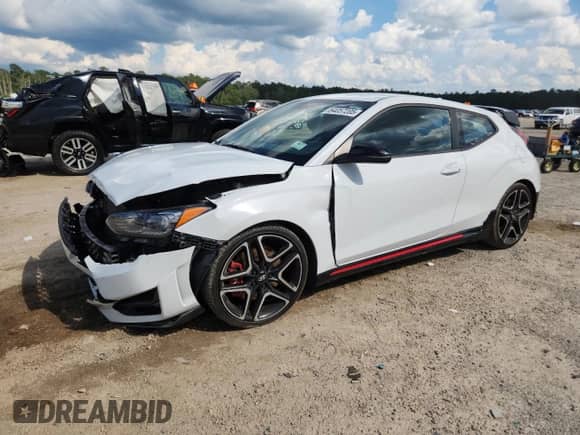 2020 Hyundai Veloster с VIN KMHT36AH7LU004857, выставлен на аукционе Copart как лот 64057205 с пробегом 67 220 миль миль и Списание • Salvage title. История ставок и продаж доступна на DreamBid. Изображение 1.