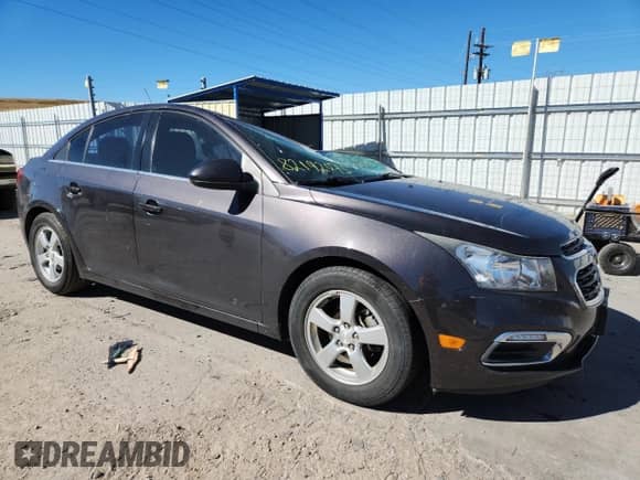 2015 Chevrolet Cruze LT z VIN 1G1PC5SB2F7283026, wystawiony jako Copart lot #82192075 z przebiegiem 99 196 mil mil oraz Szkoda całkowita • Salvage title. Historia ofert i sprzedaży dostępna na DreamBid. Obrazek 4.