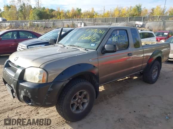 2001 Nissan Frontier SE Desert Runner with VIN 1N6ED26T21C344174, listed as a IAAI auction lot 43496361 with 260,015 mi miles and . Bid and sale history available at DreamBid. Image 2.
