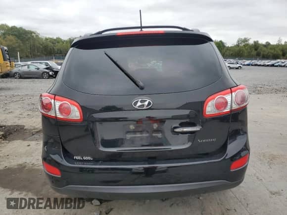 2011 Hyundai Santa Fe Limited с VIN 5XYZKDAG4BG072482, выставлен на аукционе Copart как лот 82022415 с пробегом 128 203 миль миль и Списание • Salvage title. История ставок и продаж доступна на DreamBid. Изображение 6.