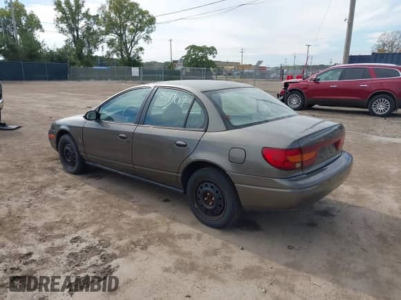 2000 Saturn SL with VIN 1G8ZK5273YZ233882, listed as a IAAI auction lot 43447019 with Not provided miles and . Bid and sale history available at DreamBid. Image 3.