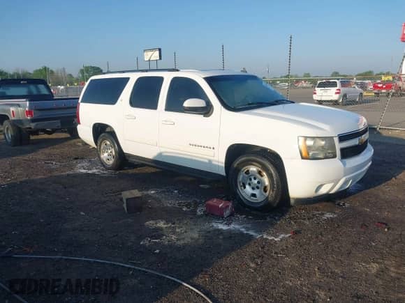 2007 Chevrolet Suburban LTZ z VIN 3GNFC16087G271075, wystawiony jako IAAI lot #42010391 z przebiegiem 217 223 mil mil oraz . Historia ofert i sprzedaży dostępna na DreamBid. Obrazek 1.