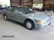 1992 Honda Accord LX with VIN JHMCB7658NC016387, listed as a IAAI auction lot 42682778 with 113,566 mi miles and . Bid and sale history available at DreamBid. Image 1.