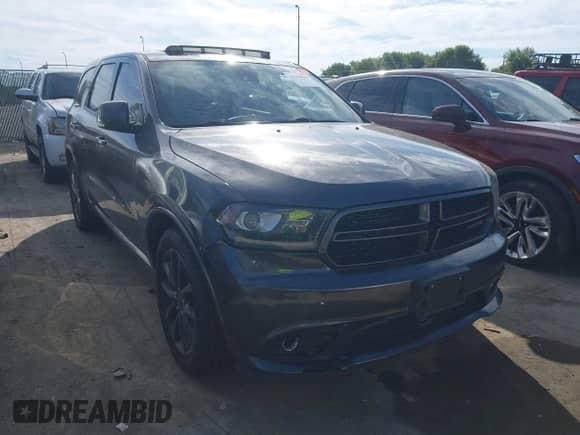 2015 Dodge Durango R/T with VIN 1C4SDJCT9FC782105, listed as a IAAI auction lot 43169541 with 119,458 mi miles and . Bid and sale history available at DreamBid. Image 1.