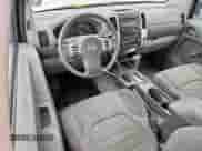 2014 Nissan Frontier S with VIN 1N6BD0CT9EN723341, listed as a Copart auction lot 63628935 with 166,878 mi miles and Clean title. Bid and sale history available at DreamBid. Image 8.