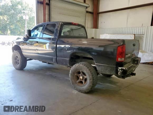 2004 Dodge 1500 SLT with VIN 1D7HU18D64S541543, listed as a Copart auction lot 84190665 with 301,451 mi miles and Clean title. Bid and sale history available at DreamBid. Image 2.