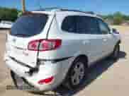 2012 Hyundai Santa Fe Limited z VIN 5XYZK4AG5CG166260, wystawiony jako IAAI lot #42113627 z przebiegiem 137 934 mil mil oraz . Historia ofert i sprzedaży dostępna na DreamBid. Obrazek 4.
