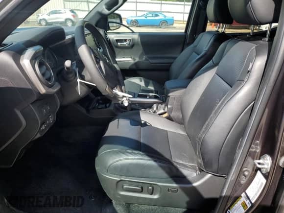 2023 Toyota Tacoma Limited с VIN 3TMEZ5CN1PM207665, выставлен на аукционе Copart как лот 56489415 с пробегом 17 084 миль миль и Списание • Salvage title. История ставок и продаж доступна на DreamBid. Изображение 7.