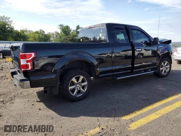 2018 Ford F-150 XL с VIN 1FTEX1C57JFB13098, выставлен на аукционе Copart как лот 80332845 с пробегом 105 306 миль миль и Списание • Salvage title. История ставок и продаж доступна на DreamBid. Изображение 3.
