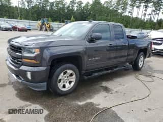 2016 Chevrolet Silverado 1500 LT with VIN 1GCVKREC6GZ319741, listed as a Copart auction lot 71495385 with 75,626 mi miles and Salvage title. Bid and sale history available at DreamBid. Image 1.