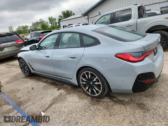 2023 BMW i4 M50 с VIN WBY33AW04PFP30405, выставлен на аукционе Copart как лот 69385745 с пробегом 50 940 миль миль и Списание • Salvage title. История ставок и продаж доступна на DreamBid. Изображение 2.