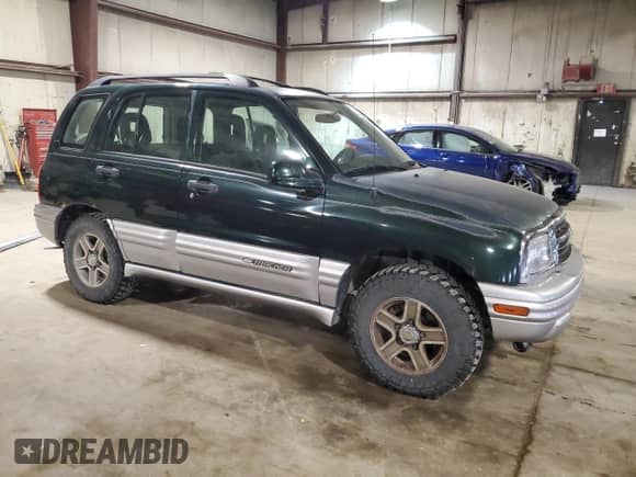 2002 Chevrolet Tracker LT с VIN 2CNBJ634126949974, выставлен на аукционе Copart как лот 54819695 с пробегом 200 895 миль миль и Списание • Salvage title. История ставок и продаж доступна на DreamBid. Изображение 4.