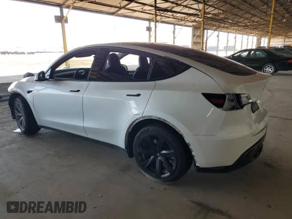 2023 Tesla Model Y Long Range with VIN 7SAYGAEE4PF833503, listed as a Copart auction lot 62376755 with 16,920 mi miles and Salvage title. Bid and sale history available at DreamBid. Image 2.