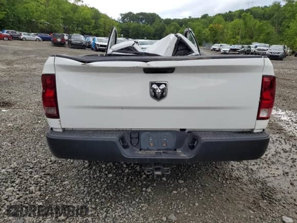 2013 Ram 1500 Tradesman with VIN 3C6JR6DG5DG596218, listed as a Copart auction lot 59677195 with 118,256 mi miles and Salvage title. Bid and sale history available at DreamBid. Image 6.