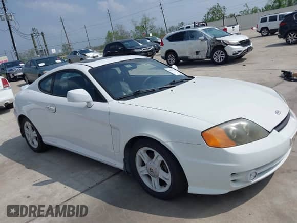 2003 Hyundai Tiburon GT с VIN KMHHN65FX3U036095, выставлен на аукционе IAAI как лот 41895465 с пробегом 179 838 миль миль и . История ставок и продаж доступна на DreamBid. Изображение 1.