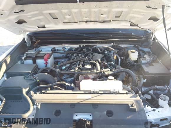 2024 Toyota Tacoma SR5 z VIN 3TMKB5FN9RM014265, wystawiony jako IAAI lot #41653742 z przebiegiem 4 772 mil mil oraz . Historia ofert i sprzedaży dostępna na DreamBid. Obrazek 10.