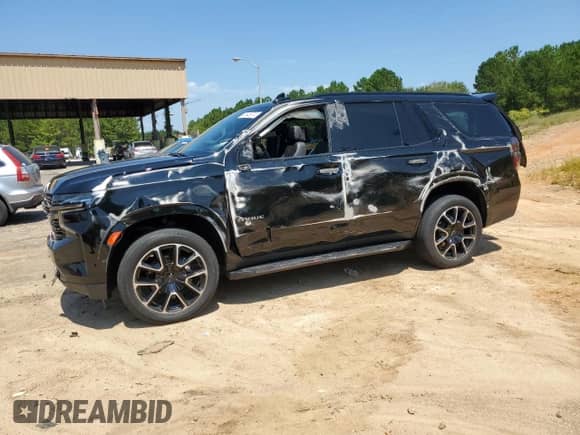 2021 Chevrolet Tahoe RST z VIN 1GNSCRKD9MR174940, wystawiony jako Copart lot #68545674 z przebiegiem Nie podano mil oraz Szkoda całkowita • Salvage title. Historia ofert i sprzedaży dostępna na DreamBid. Obrazek 1.