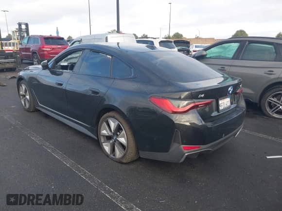 2023 BMW i4 eDrive35 with VIN WBY43AW02PFP50656, listed as a IAAI auction lot 41776504 with 18,024 mi miles and . Bid and sale history available at DreamBid. Image 14.