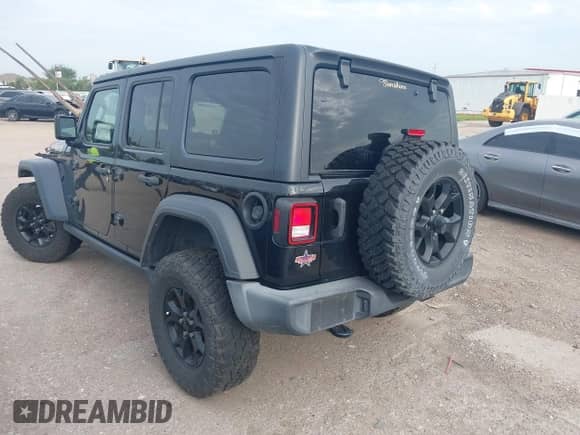 2021 Jeep Wrangler Unlimited Willys with VIN 1C4HJXDN7MW649070, listed as a IAAI auction lot 42656152 with 53,227 mi miles and . Bid and sale history available at DreamBid. Image 3.