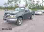 2002 Ford F-150 XL z VIN 1FTRF18L72NB55841, wystawiony jako IAAI lot #43467617 z przebiegiem 175 289 mil mil oraz . Historia ofert i sprzedaży dostępna na DreamBid. Obrazek 2.