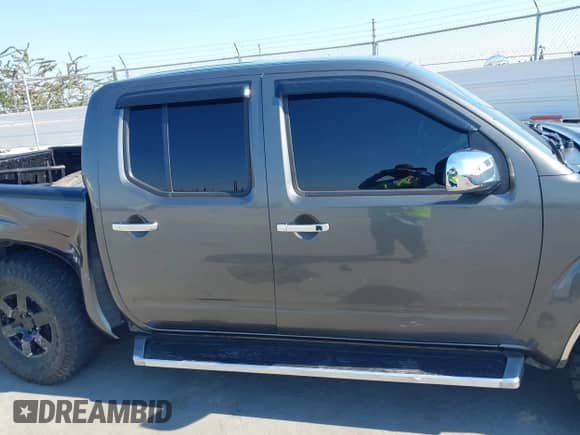 2009 Nissan Frontier SE with VIN 1N6AD07W49C403281, listed as a IAAI auction lot 42758532 with 198,273 mi miles and . Bid and sale history available at DreamBid. Image 13.