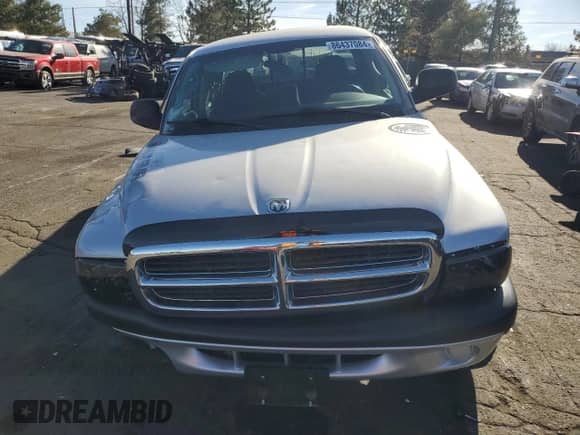 2004 Dodge Dakota Sport with VIN 1D7HG32N54S749241, listed as a Copart auction lot 86437084 with 94,879 mi miles and Salvage title. Bid and sale history available at DreamBid. Image 5.