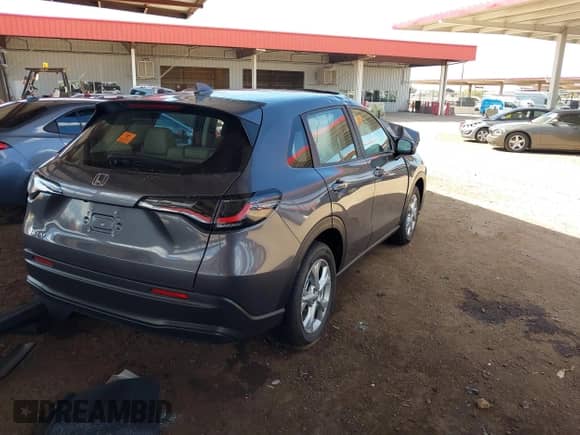 2025 Honda HR-V LX with VIN 3CZRZ1H31SM735792, listed as a IAAI auction lot 43194839 with Not provided miles and . Bid and sale history available at DreamBid. Image 4.