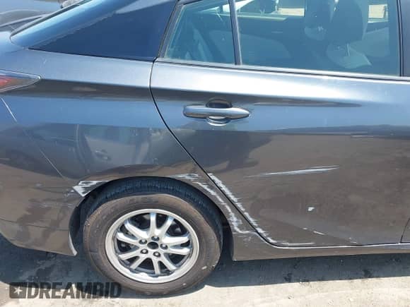 2016 Toyota Prius Two with VIN JTDKBRFUXG3020413, listed as a IAAI auction lot 42990979 with 102,663 mi miles and . Bid and sale history available at DreamBid. Image 18.