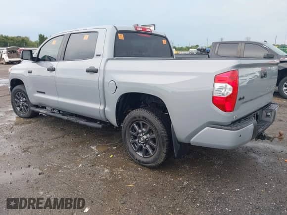 2021 Toyota Tundra SR5 z VIN 5TFDY5F17MX016636, wystawiony jako IAAI lot #42870595 z przebiegiem 122 582 mil mil oraz . Historia ofert i sprzedaży dostępna na DreamBid. Obrazek 3.