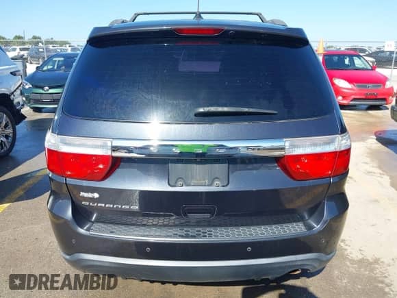 2013 Dodge Durango SXT with VIN 1C4RDHAGXDC680418, listed as a IAAI auction lot 42851105 with 149,216 mi miles and . Bid and sale history available at DreamBid. Image 16.