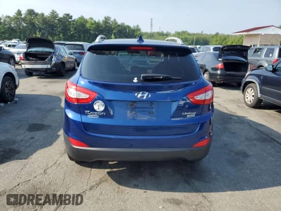 2014 Hyundai Tucson Limited with VIN KM8JUCAG9EU796720, listed as a Copart auction lot 60671805 with 130,114 mi miles and Salvage title. Bid and sale history available at DreamBid. Image 6.