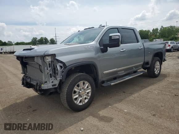 2024 Chevrolet Silverado 2500HD High Country с VIN 2GC4YRE74R1198491, выставлен на аукционе Copart как лот 59102245 с пробегом 24 184 миль миль и Списание • Salvage title. История ставок и продаж доступна на DreamBid. Изображение 1.