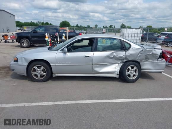 2004 Chevrolet Impala LS with VIN 2G1WH52K449252935, listed as a IAAI auction lot 42776265 with 176,789 mi miles and . Bid and sale history available at DreamBid. Image 14.