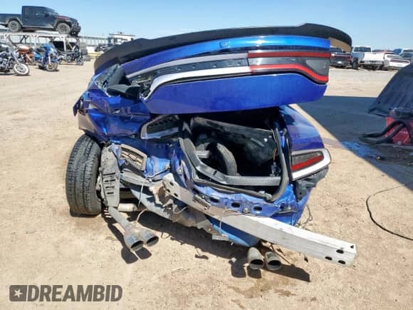 2021 Dodge Charger SXT z VIN 2C3CDXBG2MH624831, wystawiony jako Copart lot #84069805 z przebiegiem 89 476 mil mil oraz Czysty tytuł • Clean title. Historia ofert i sprzedaży dostępna na DreamBid. Obrazek 6.