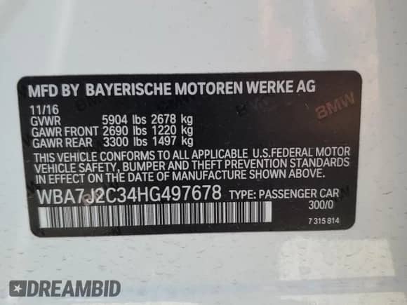 2017 BMW 7 Series 740e xDrive with VIN WBA7J2C34HG497678, listed as a Copart auction lot 55715124 with 40,852 mi miles and . Bid and sale history available at DreamBid. Image 12.